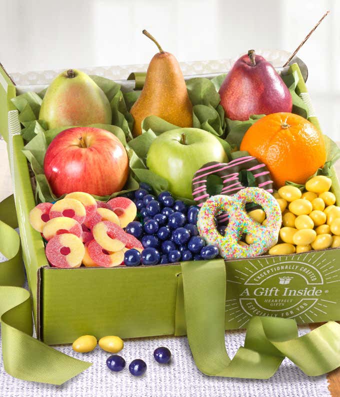 Springtime Gift Box: D'Anjou Pears, Red Pear, Braeburn Apples, Granny Smith Apple, Navel Oranges, Chocolate Dipped Spring Pretzels, Lemon Crème Almonds, Gummy Peach Rings, Chocolate Covered Dried Blueberries, Assorted Ghirardelli Chocolate Squares.
